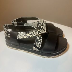 Black and white Sorel sandals. Brand new
